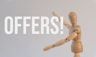 Wooden mannequin that says 