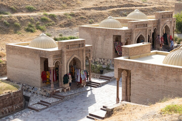 Traditional Central Asian style bazar street inside the reconstructed Hisor fortess in Hisor, Tajikistan