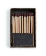 Naklejka premium A vintage matchbox filled with wooden matches, perfect for nostalgic decor.