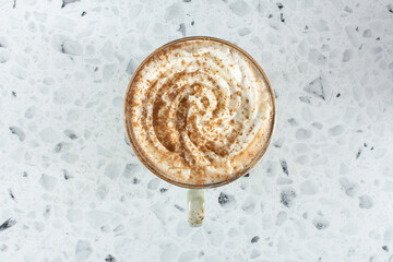 A top down view of a mug of white chocolate mocha.