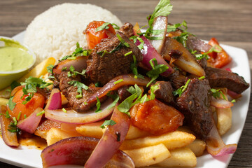 A closeup view of a plate of lomo saltado.