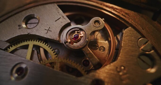 Macro Shot of Mechanical Clock Movement Showing Gears, Wheels and Balance Mechanism. Detailed Close Up, Concept of Time, Craftsmanship, Horology, Precision Engineering and Beauty of Complexity.