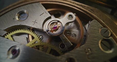 Macro Shot of Mechanical Clock Movement Showing Gears, Wheels and Balance Mechanism. Detailed Close Up, Concept of Time, Craftsmanship, Horology, Precision Engineering and Beauty of Complexity. - Powered by Adobe