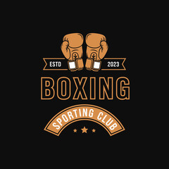 Fototapeta premium Vintage boxing gloves emblem with 