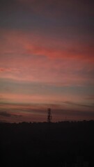 sunset over the telecommunication tower