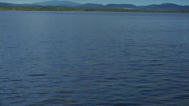 Wewak sea harbour view Wewak Hill Cape Wom Dogreto aerial drone Papua New Guinea Pacific Ocean pristine remote tropical jungle untouched beach coastline sunny dry season blue sky morning forward pan