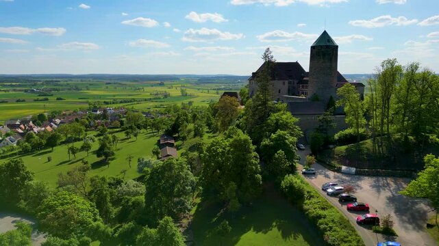 4K Aerial Drone Video of the Farmland Surrounding the Beautiful Colmberg Castle near Ansbach, Germany in Bavaria