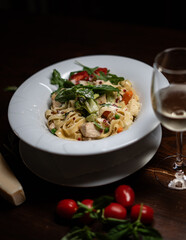 Tagiatelle pasta with chicken and tomato