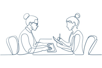 Two women in a meeting one typing and the other taking notes