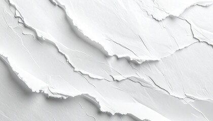A textured white surface with layered, jagged edges creating a wave-like pattern