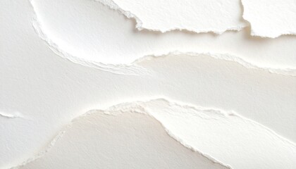 Close-up of layered white paper, torn edges create abstract textural design