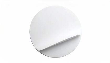 A white circular sticker with a curled edge, isolated against a clean white backdrop