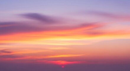 Naklejka premium Fiery Sunset with Colorful Clouds and Horizon at Dusk