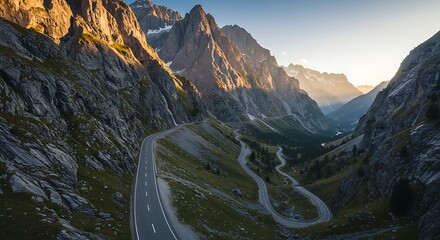 Winding road through majestic mountains at golden hour scenic landscape