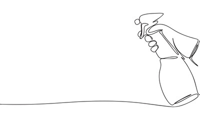 Hand holding spray bottle cleaning