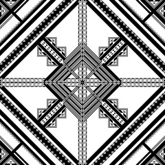 Geometric pattern featuring intricate black and white designs with symmetrical shapes and lines, creating visually striking effect