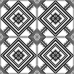 Geometric pattern featuring intricate black and white designs with diamonds and lines, creating visually striking and symmetrical appearance