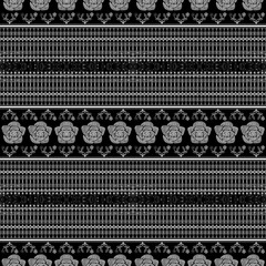 Elegant floral pattern featuring roses and intricate designs on black background, perfect for textiles or wallpaper