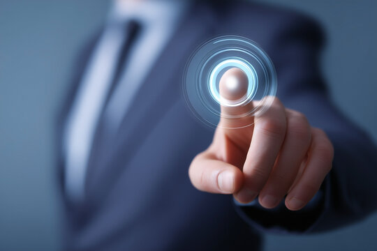 Interface activation: Man in a suit presses an invisible glowing user interface button. Futuristic technology and user interaction shown.