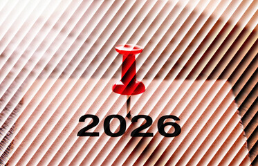 Red pin marks year 2026 on brown paper — modern minimal abstract calendar theme design featuring clean futuristic light waves and layered motion style