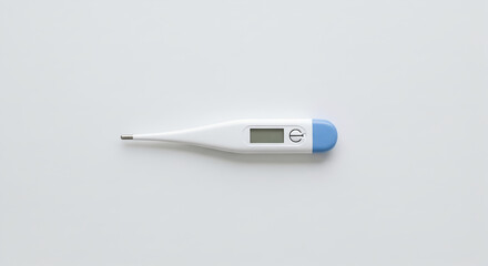 A Digital Thermometer for Fever Measurement on a White Surface
