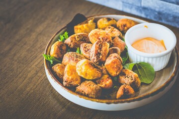 Gnocco Fritto Deep fried gnocchi stuffed with spicy beef, ricotta cheese with Sriracha mayo sauce