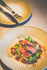 Grilled Lamb Tenderloin Spring onion purée, anchovy, Kanzuri chilli oil, turnip herb