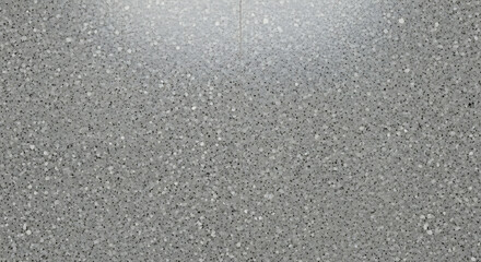 Abstract textured gray background with subtle light gradient