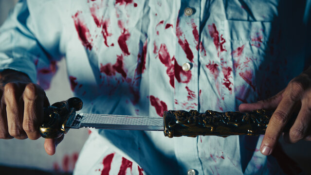 The Hand of a Murderer Closes a Knife in the Holster The Scary Night of Darkness