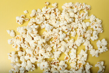 popcorn on a yellow background top view
