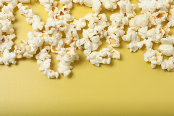 popcorn on a yellow background top view
