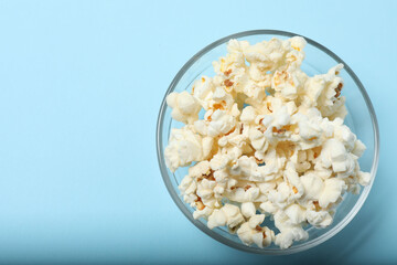 popcorn on a blue background top view
