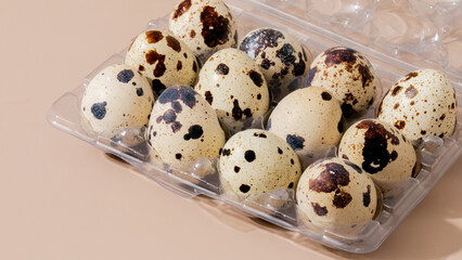 A dozen speckled quail eggs rest serenely in their carton, evoking thoughts of Ostara feasts and...