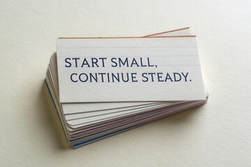 Index Card with Quote Reading Start Small Continue Steady