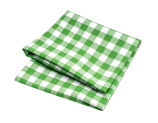 Folded green and white checkered cloth, neatly stacked, set against black background