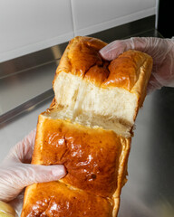Fluffy, golden brioche loaf, perfect for Carnival indulgences, evokes a buttery embrace with gluten's whimsical dance, Food Celebrations April 5, 2025, Barcelona, Spain