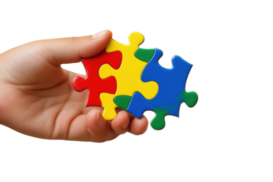 Hand holding colorful puzzle pieces isolated on transparent background. Hand holding single piece of puzzle isolated on white background.