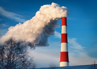 Industrial chimney with smoke symbolizing CO2 emissions, air pollution, global warming, and climate change; ideal for ecological reports and sustainability projects