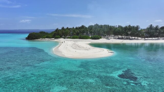 Aerial view of a tropical island featuring white sand beaches and turquoise waters, showcasing the natural beauty, Naavaidhoo, Haa Dhaalu Atoll, Maldives.
