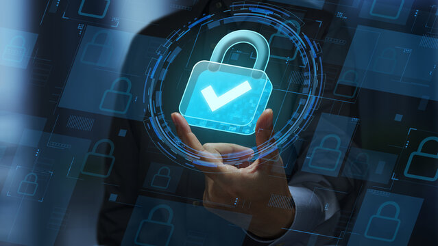 Zero Trust security and encrypted network access. Microsegmentation and access management. Businessperson holding padlock icon with a checkmark.