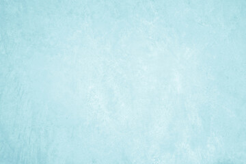 Pastel blue and white concrete stone texture for background in summer wallpaper. Cement and sand wall of tone vintage. Concrete abstract wall of light cyan color, cement texture mint green for design.