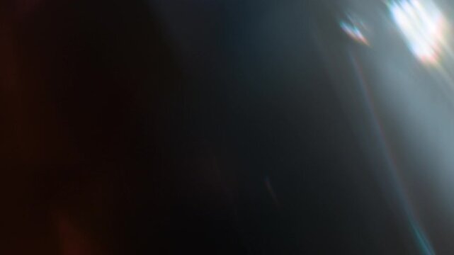 Real Shooted Cinematic Lens Flare Overlay on Black Background at 1000fps Slow Motion.