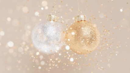 Festive Christmas baubles, shimmering in gold and silver confetti. 3d rendering Christmas greeting and winter season design. New year celebration background