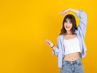 Woman point index fingers aside, portrait of young caucasian 20s beautiful hot woman point index...