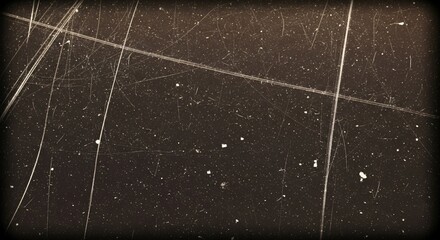 A vintage scratched or grunge texture, often used as a background or an overlay to create an old film or distressed effect.