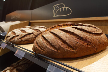 Fresh breads on a counter of the grocery store
