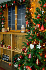 The evening window of the attic with Christmas decorations