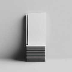 Tall stack of clean, textured cards against a wall