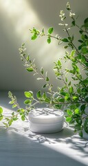 Cream jar sits near green leafy branches in sunlit scene