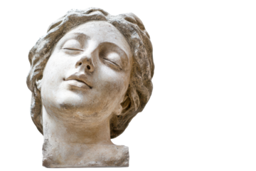 Ancient marble sculpture of a sleeping woman's head isolated on transparent background. Gypsum copy of ancient statue venus head isolated on white background.